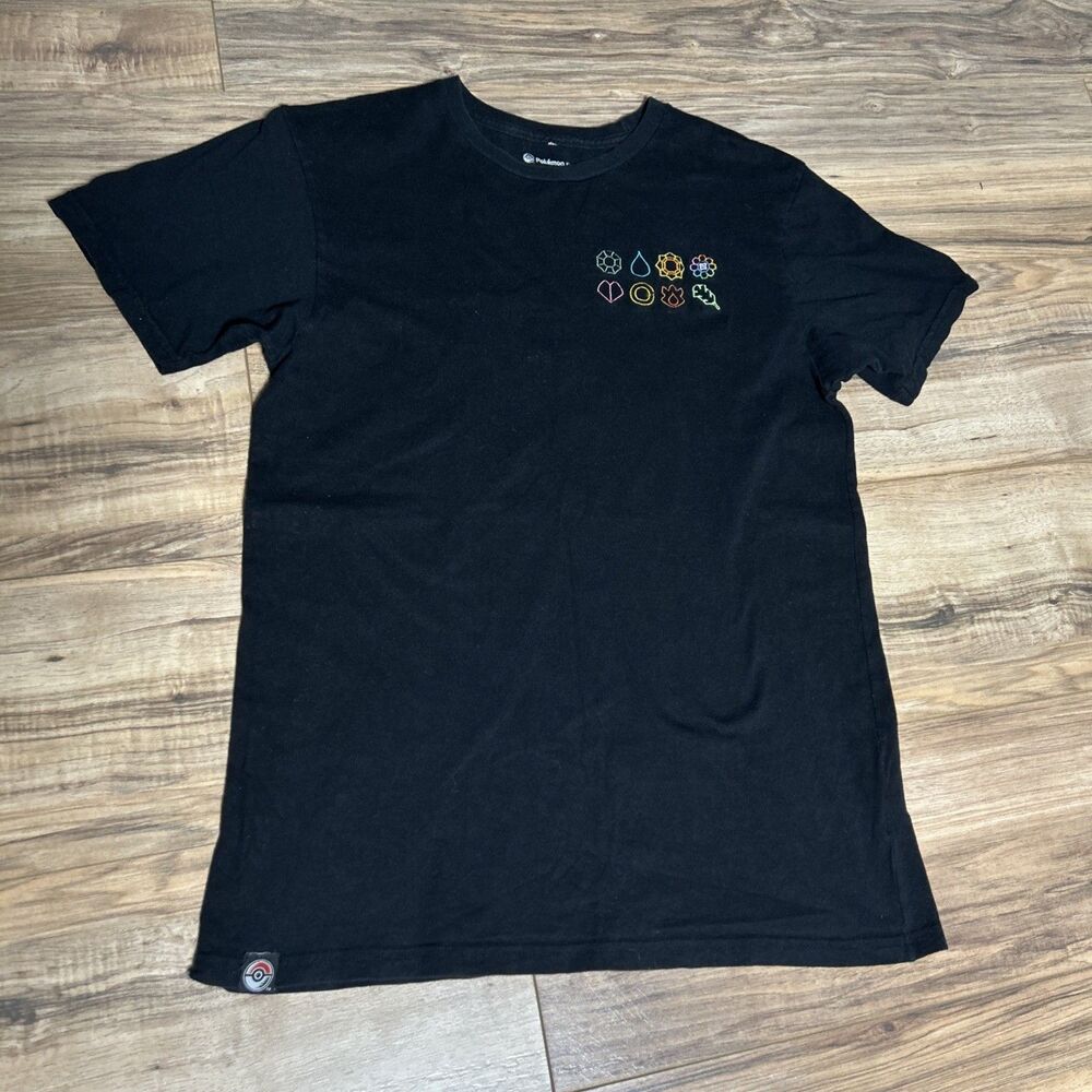 Pokemon Center Kanto Gym Badge Black Relaxed Fit Crew Neck T-Shirt Size Medium